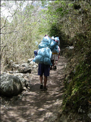 Porters on the first uphill 